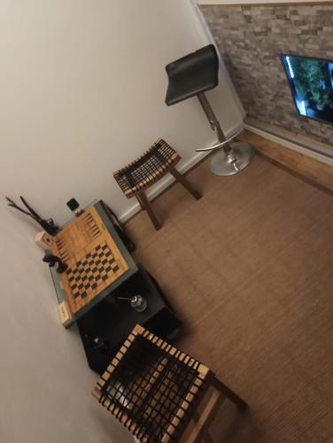 an overhead view of a room with a desk and a chair at BeauTour in Sacavém