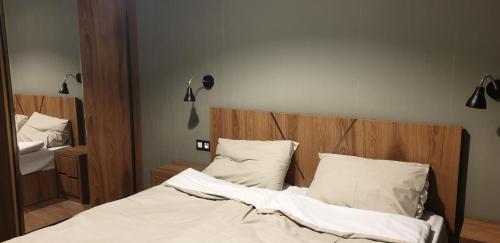 מיטה או מיטות בחדר ב-Love Journey Tbilisi
