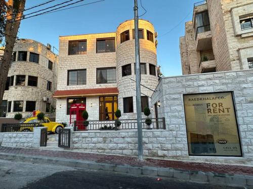 a building with a for rent sign in front of it at 5/ Antica jabalal-lwebdeh in Amman
