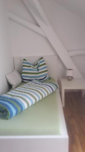 Una cama o camas en una habitación de Ferienwohnung Straubing/Dingolfing