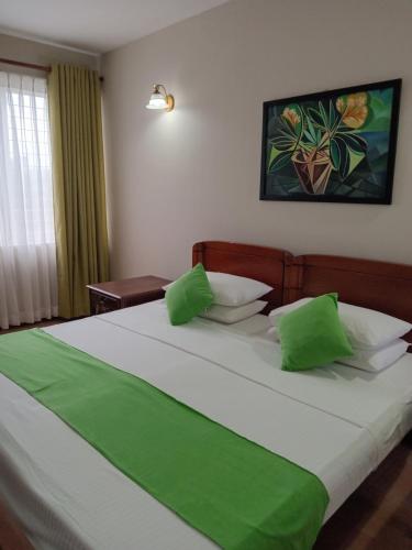 Ένα ή περισσότερα κρεβάτια σε δωμάτιο στο Rockwood Apartment Colombo 7