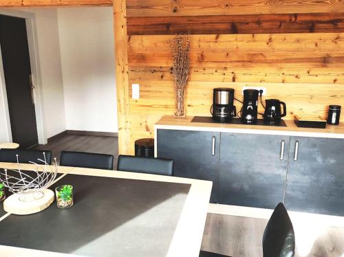 Příslušenství pro přípravu čaje a kávy v ubytování Gîte Papillon 6 à14 personnes - Jacuzzi