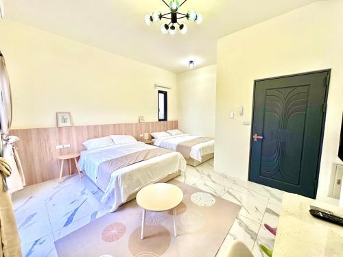 Katil atau katil-katil dalam bilik di 睡飽飽民宿 Sleeping Well B&B 全新電梯民宿