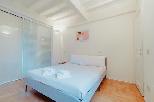 a small bedroom with a bed in a room at Vista e Tetti ai Canacci in Florence