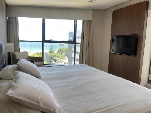 Katil atau katil-katil dalam bilik di BEACH CLASS INTERNACIONAL FRENTE MAR