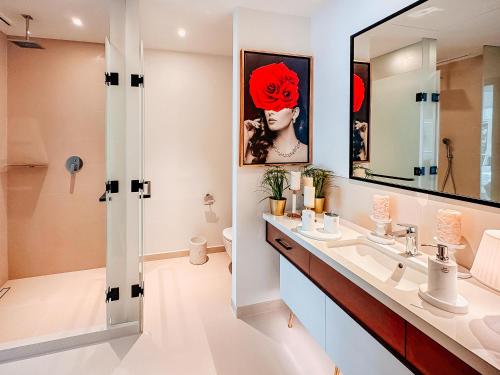 a bathroom with a sink and a mirror at Vida Dubai Marina & Yacht Club, Hotel and Residences, Luxurious 2BR in Dubai
