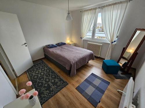 Apartman Olimpijski Vučko tesisinde bir odada yatak veya yataklar