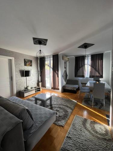 Zona d'estar a Apartman “MEGI”