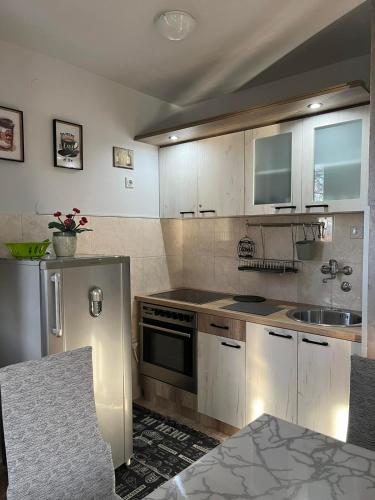 Cuina o zona de cuina de Apartman “MEGI”