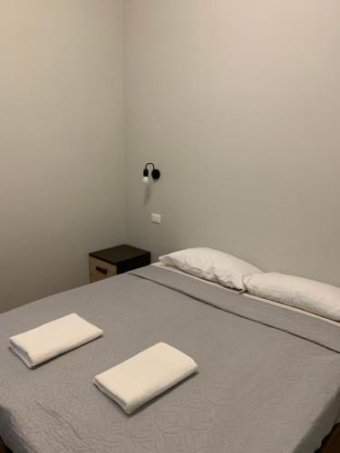 Voodi või voodid majutusasutuse GRAMSCI 2 rooms toas
