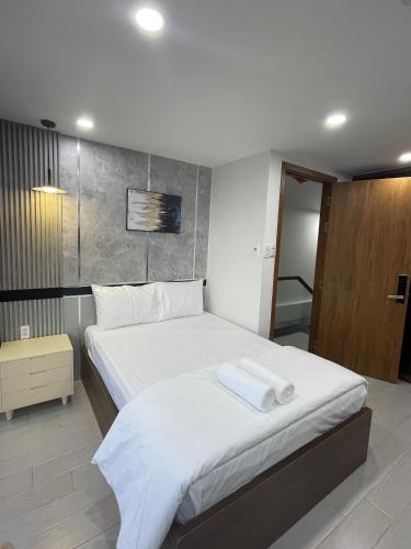 Postel nebo postele na pokoji v ubytování Lagi Beach Hotel