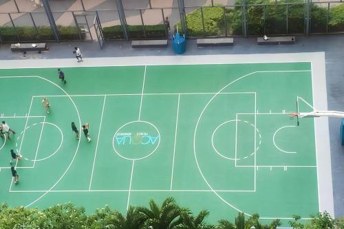 an overhead view of a basketball court at Aveline Suites Elite Rockwell view ACQUA Private Residences near Rockwell Makati in Manila