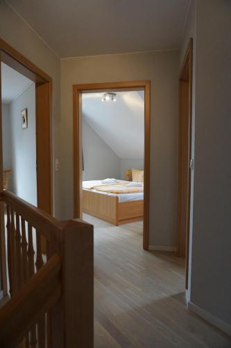 Katil atau katil-katil dalam bilik di Maisonetten Apartment