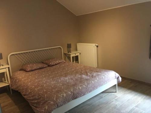 Postel nebo postele na pokoji v ubytování Gîte du Pont de Bois