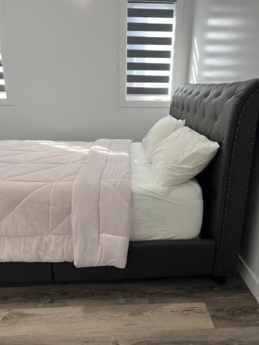 Ένα ή περισσότερα κρεβάτια σε δωμάτιο στο Peniel Apartments