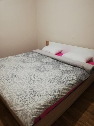 Ένα ή περισσότερα κρεβάτια σε δωμάτιο στο MP Appartement