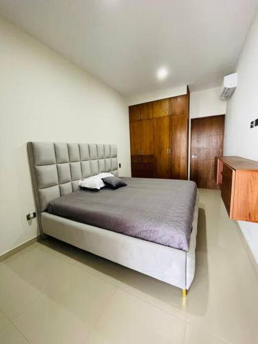 Postel nebo postele na pokoji v ubytování Hospedate En Elegante Penthouse En Culiacan