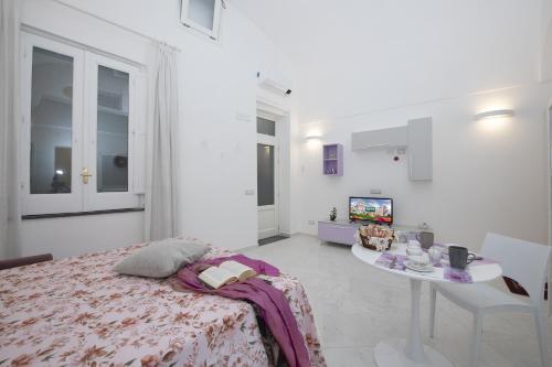 Postel nebo postele na pokoji v ubytování La Casa del Marinaio