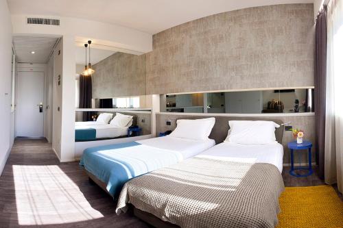 Postel nebo postele na pokoji v ubytování Albavilla Hotel & Co