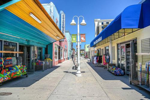 a city street with shops and a street light at Something Fishy at Island Breeze of CB in Carolina Beach