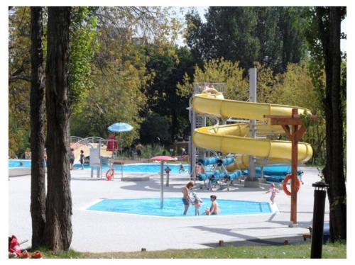a group of children playing in a water park at Superior Center 2 Rooms! Parking! Reception24h! in Warsaw