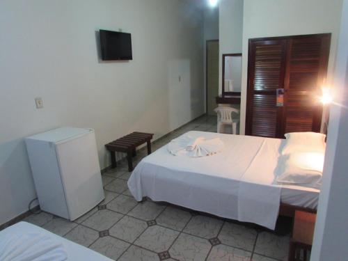 Katil atau katil-katil dalam bilik di Thanharu Praia Hotel