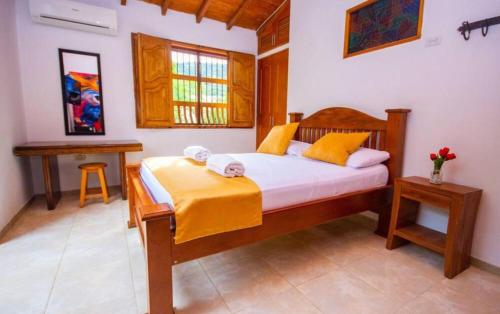 Postel nebo postele na pokoji v ubytování Hotel San Sebastian del Tonusco