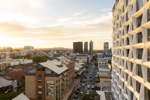 a view of a city with a tall building at Hotel X Brisbane Fortitude Vly, Vignette Collection by IHG in Brisbane