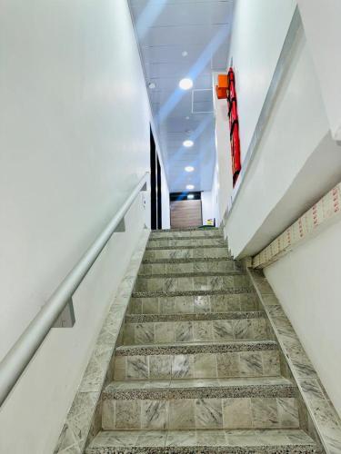 a flight of stairs in a building at Apartamentos turísticos Mirador de la 20 in San Andrés