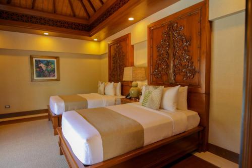 Postel nebo postele na pokoji v ubytování Highland Bali Villas, Resort and Spa