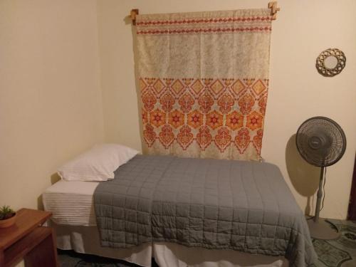 Säng eller sängar i ett rum på Chill House Flores