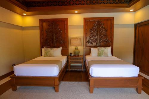Postel nebo postele na pokoji v ubytování Highland Bali Villas, Resort and Spa