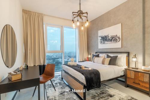 a bedroom with a bed and a desk and a window at Manzil - 2BR Apt in Al Wasl Residences with Park View, Dubai Trade Center in Dubai