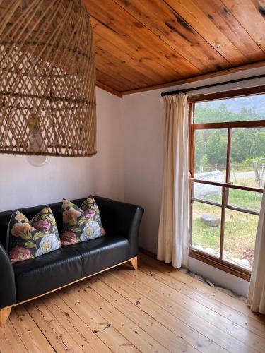 A seating area at Willdenowia Guestsuite at Waboom Family Farm