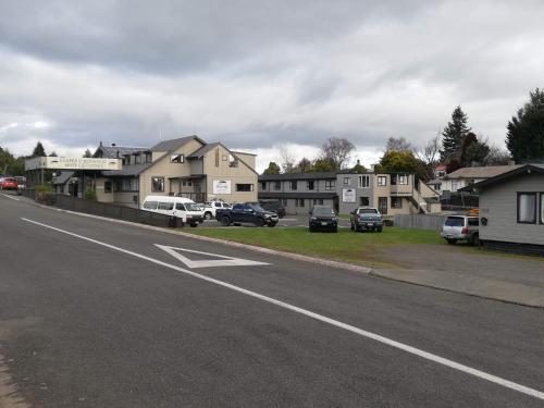 a street with cars parked on the side of a road at Ruapehu Mountain Motel & Lodge in Ohakune