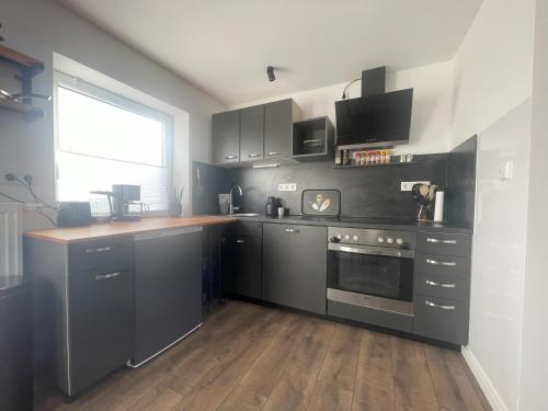 Kuchyň nebo kuchyňský kout v ubytování GRYT Home - FeWo XXL - Nähe Nordsee