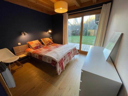 Postel nebo postele na pokoji v ubytování Chalet le Lotus Blanc