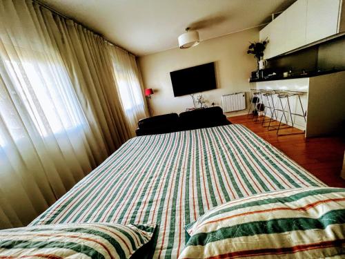 Ένα ή περισσότερα κρεβάτια σε δωμάτιο στο Vasco de Gama Apartment : Your Stylish Apartment Near Vasco de Gama
