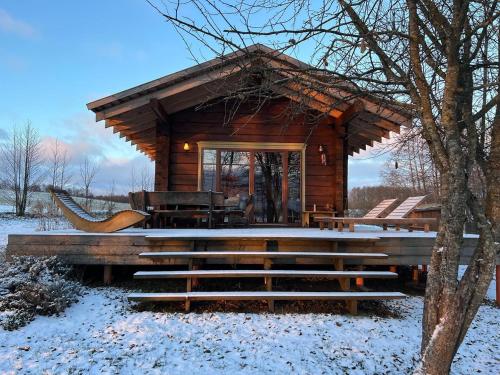 Charming wooden house on the private shore of the lake