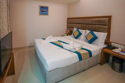 Ένα ή περισσότερα κρεβάτια σε δωμάτιο στο Pine Tree Boutique Hotel