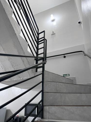 a set of stairs in a building at Spot Hotel e pousada in Uberlândia