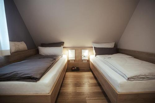 Postel nebo postele na pokoji v ubytování Schicke Bude