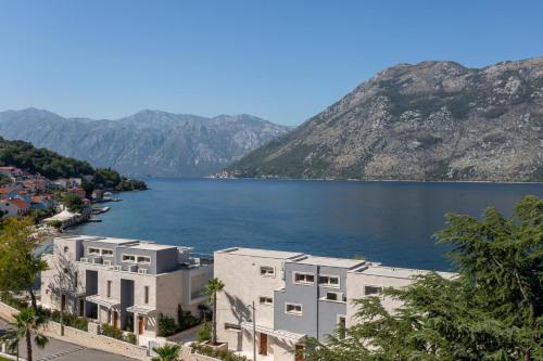 a view of a large body of water with mountains at Hyatt Regency Kotor Bay Resort in Kotor