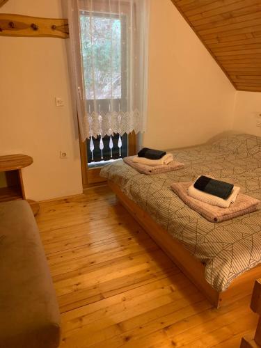 Ένα ή περισσότερα κρεβάτια σε δωμάτιο στο Apartments Nune 2