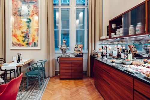 ห้องอาหารหรือที่รับประทานอาหารของ Small Luxury Hotel Altstadt Vienna