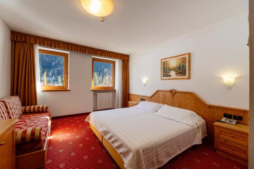 Кровать или кровати в номере Sport Hotel Cristal
