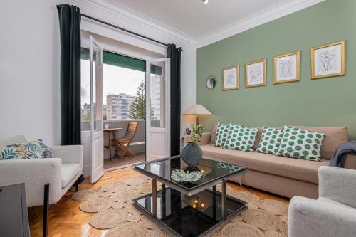 Classy 4BDR Apartment W/ Balcony by LovelyStay