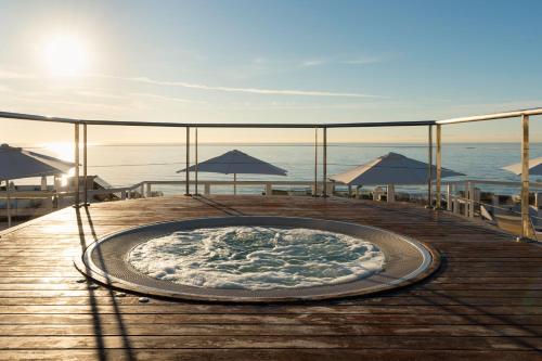 a hot tub on the deck of a boat at Aluasun Lago Rojo - Adults recommended in Torremolinos