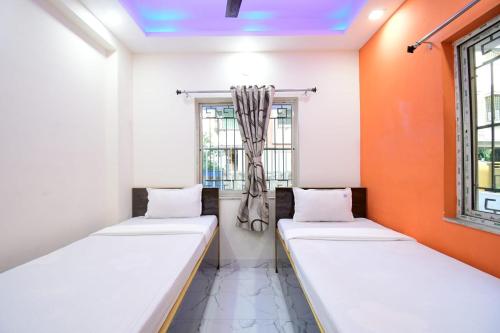Katil atau katil-katil dalam bilik di Garden Guest House 250m from VFS Global & Rene Tower , acropolis mall