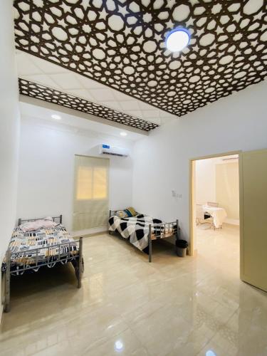 Ένα ή περισσότερα κρεβάτια σε δωμάτιο στο EK Homes